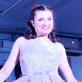 Student Ionna Saviolidis models a dress from Le Château down the catwalk at the “Welcome to the 60s” fashion show at Summit School on April 25. 
