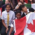students with flags outdoors
