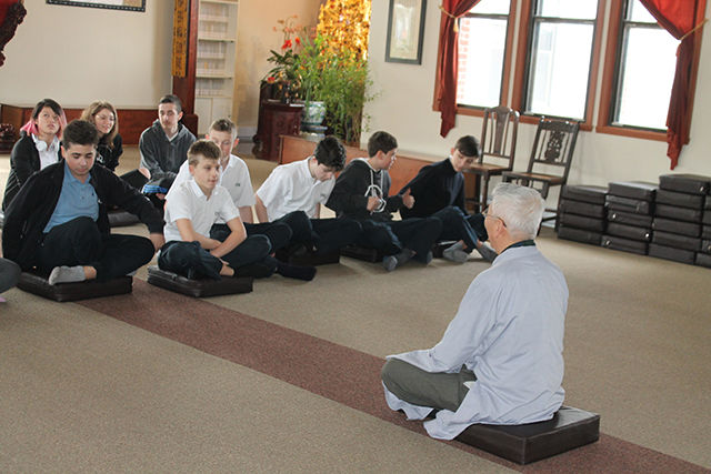 Students learning how to meditate