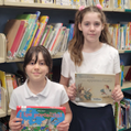 students holding italian books