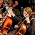 students playing their instruments