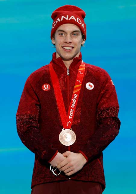 Gatineau’s Alexis Guimond earned the bronze medal in the men’s standing Super-G event in Beijing on March 6. Photo: Canadian Paralympic Committee/Christian Petersen/Getty Images.