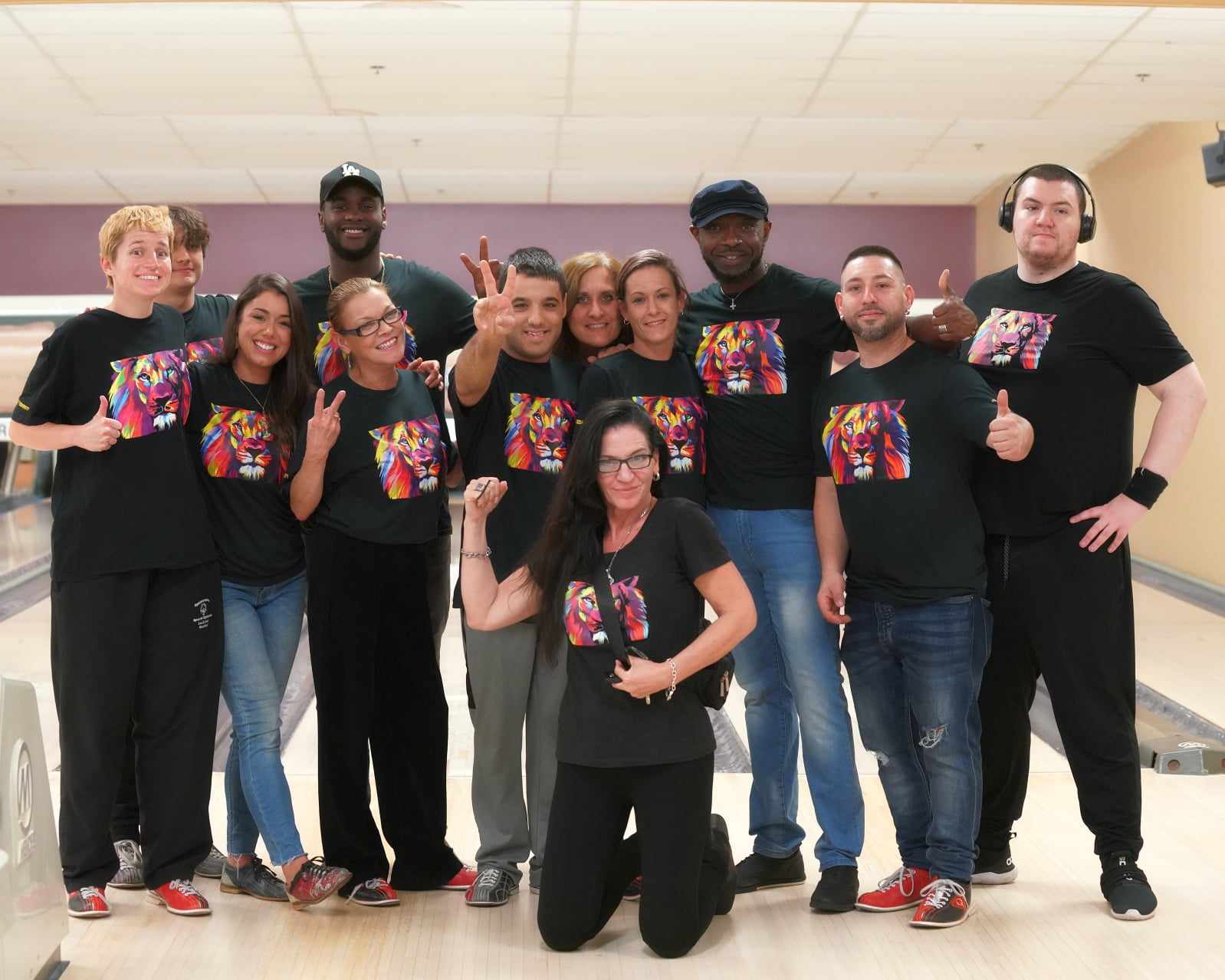 The Montreal Autism Community Lions Club (MACLC) strikes a pose during their bowling fundraiser on October 21. Founder of MACLC Lori-Ann Zemanovich is seen kneeling in the front row. Photo: Kevin J Raftery, PCJ Sport Photography 