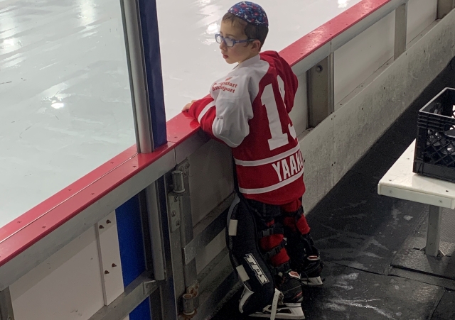 Yaakov Aintabi loves the Zamboni, watching as it cleans the ice long after practice has ended in January.