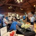 Attendees admire the art donated by Dunany Studio Artists.   Photo courtesy of Jaime Bisaillon     