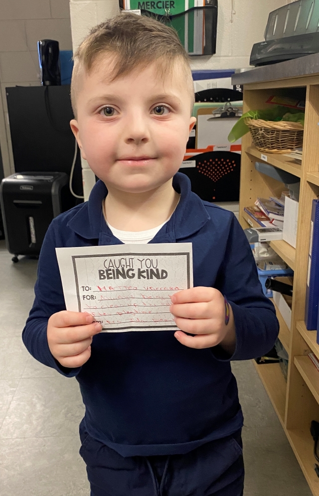 Matteo Vaccaro, a pre-K student at Honoré Mercier Elementary during the 2023-2024 school year, was “caught” willing to help clean up the classroom after playtime without being asked. “Even at this young age, the students were so excited to model kind acts,” said Mary Poullas, personal development and community involvement animator at the school. Photo courtesy of M. Poullas 