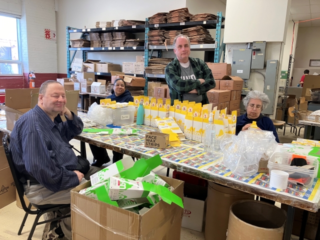 JEM employees, from left: Leslie Perryon, Penny Maria Lee, Andrew Blankfort and Mindy Grill pack and assemble products in the factory on January 30, 2024.