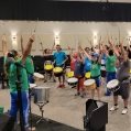 Trouve ta voie participants enjoy a drumming workshop in July 2023 with the Zuruba Afro-Brazilian percussion troupe. Photo: Josiane Beauchamp