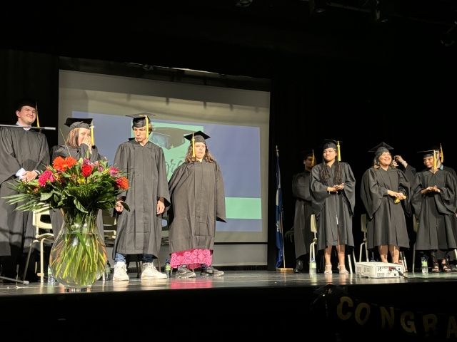 Graduates Vincent, Anastasia, Kirill, Jesse, Kylie, Trisha and Marry-Ann at the John Grant High School graduation on June 6 in the Syd Wise auditorium.